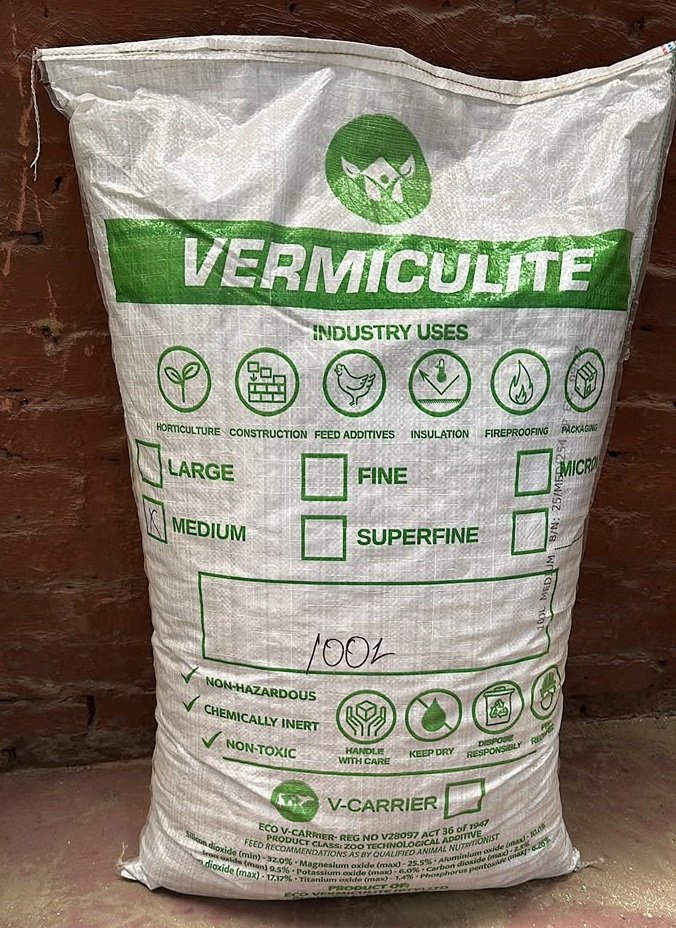 Exfoliated vermiculite for feed premix and carrier applications